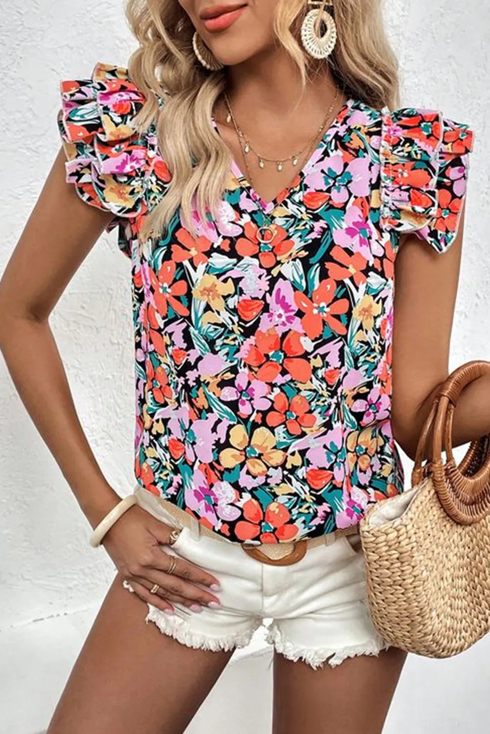 Blouse florale multicolore à manches volantées et à volants