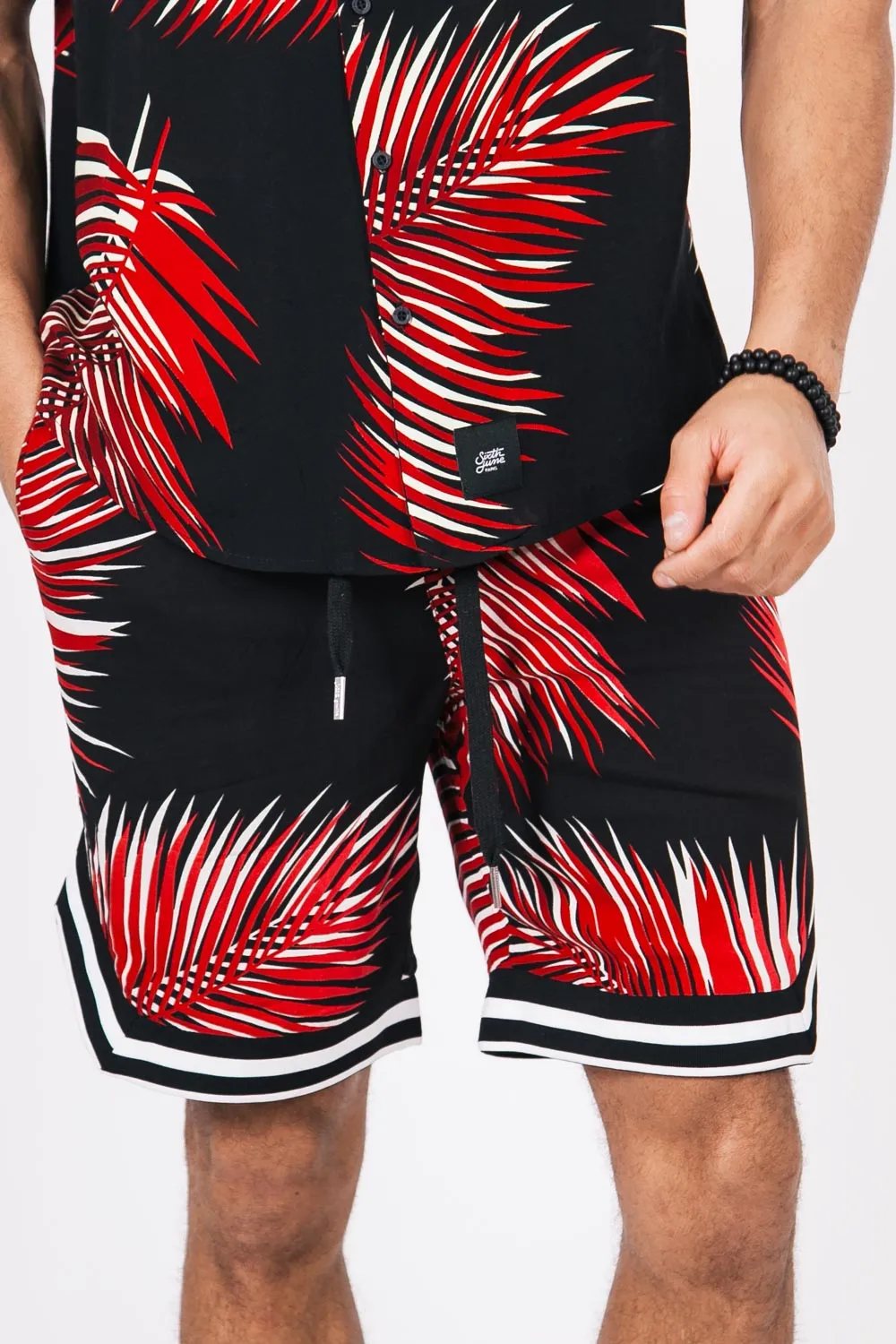 Short feuilles palmiers noir rouge
